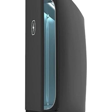 The image shows the PhoneSoap XL, a large UV sanitizer designed to enhance hygiene by thoroughly disinfecting personal items. The product features a sleek, modern design with a rectangular compartment that can accommodate multiple devices or larger items. The UV light mechanism is highlighted, emphasizing its capability to kill germs effectively. The PhoneSoap XL is showcased in a clean, minimalist setting, reflecting its purpose in promoting cleanliness and health.
