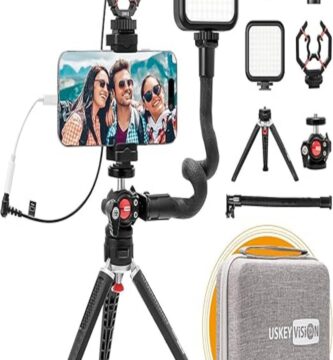Alt text: "USKEYVISION V-Master Vlogging Kit displayed on a table, featuring a compact tripod, smartphone holder, LED ring light, and external microphone, illustrating an all-in-one solution for vloggers."