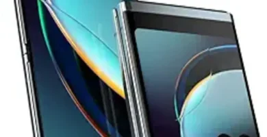 Since the image is not visible to me, I can provide you with a generic template for alt text based on the given information: "Image of the Motorola Razr+ 2023 smartphone. The phone has a sleek, modern design with a foldable display. The screen shows vibrant colors and a high-resolution interface, highlighting its advanced display technology. The exterior features a glossy finish, reflective of its cutting-edge design. Text on the image reads: 'Discover the Motorola Razr+ 2023: Revolutionize Your Smartphone Experience.'"