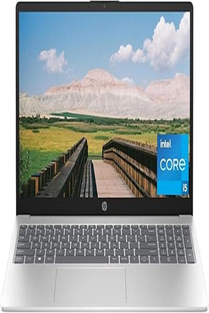 Alt text: "An advertisement for the HP 15-Inch Powerhouse laptop. The image features a sleek and modern laptop with a prominent display of its screen showcasing vibrant graphics. The laptop is positioned in a way that highlights its thin profile and elegant
