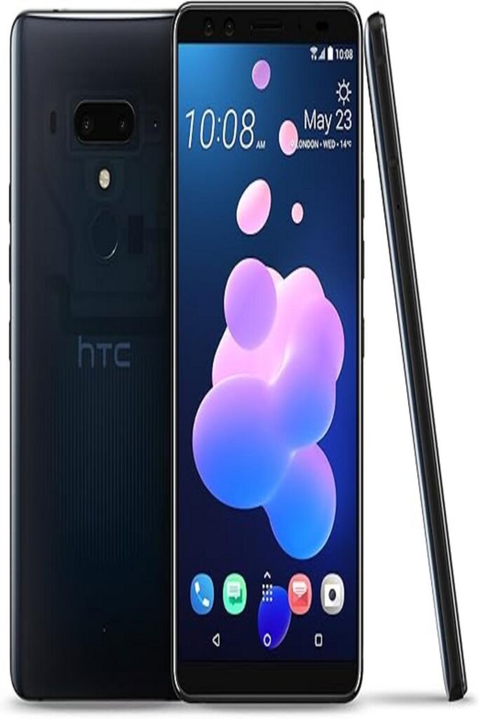 The image features the HTC U12+ smartphone. It showcases the sleek design of the phone with its shiny, reflective body and edge-to-edge display. The smartphone is positioned at an angle to highlight its slim profile and advanced features. The phone screen displays