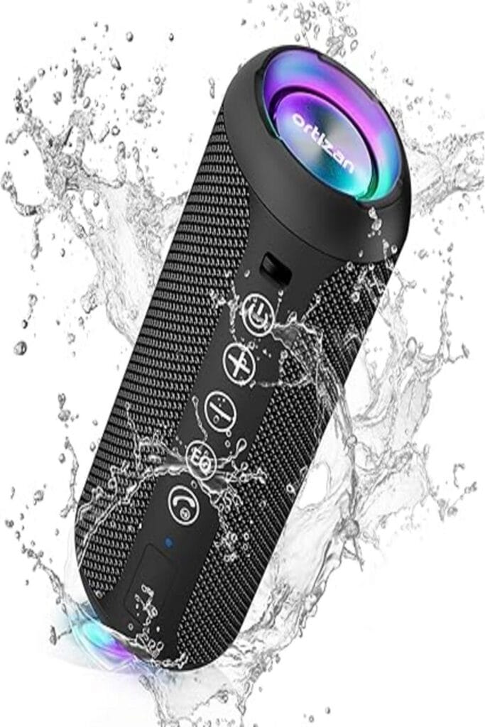 "Ortizan Bluetooth Speaker with vivid LED lights on a wooden table."