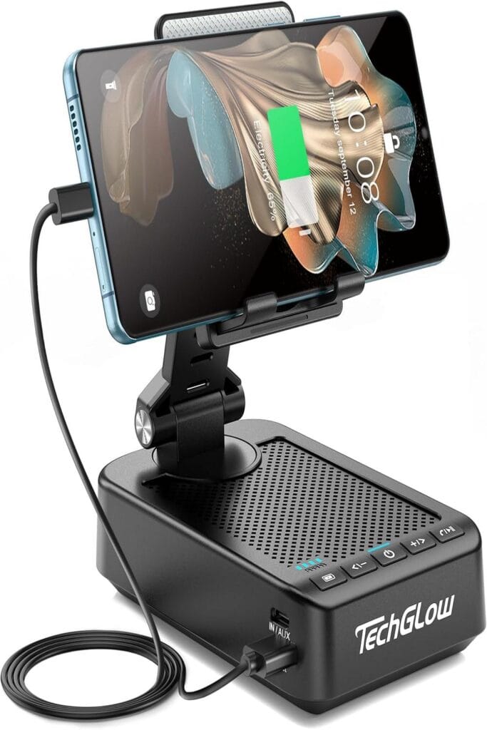 "TechGlow Foldable Stand displayed elegantly on a desk with colorful ambient lighting."
