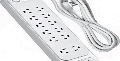 Power strip with surge protection and multiple outlets on a white background.