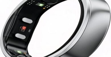 Gold smart ring with health tracking features showcased on a sleek black box.