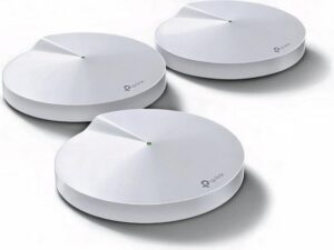 TP-Link Deco M5 routers enhancing Wi-Fi coverage in a home setting.