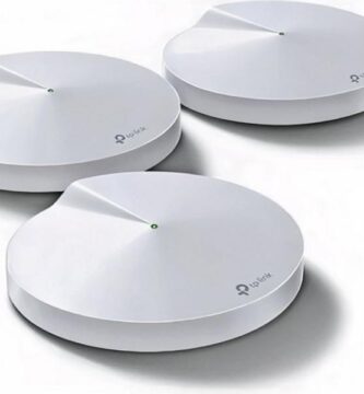 TP-Link Deco M5 routers enhancing Wi-Fi coverage in a home setting.